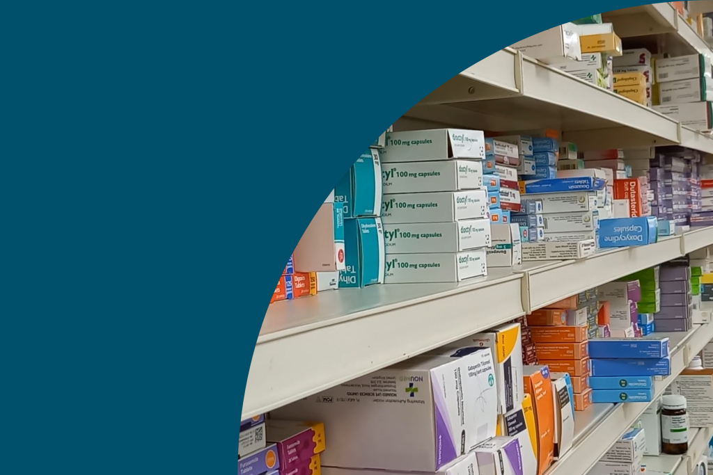 image showing medicine on a shelf in a pharmacy