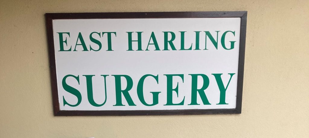 picture of the east harling surgery sign
