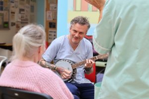 Mark Rushmere, NSFT Activities Coordinator, performing on his ukele